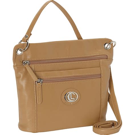 Carryland Purse Cream Brown Has so many compartments 2 zipper sections 8 slot card section, mirror 22" drop at last adjustable hole 8 x 10 I’d love to accept your offer. Bundle to save 10% on 2+ items, Please bundle to get the greatest discount.